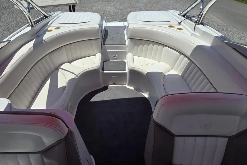 Slide: The Image of Luxurious interior of a 2003 Cobalt 282 boat with white leather seating. - 6