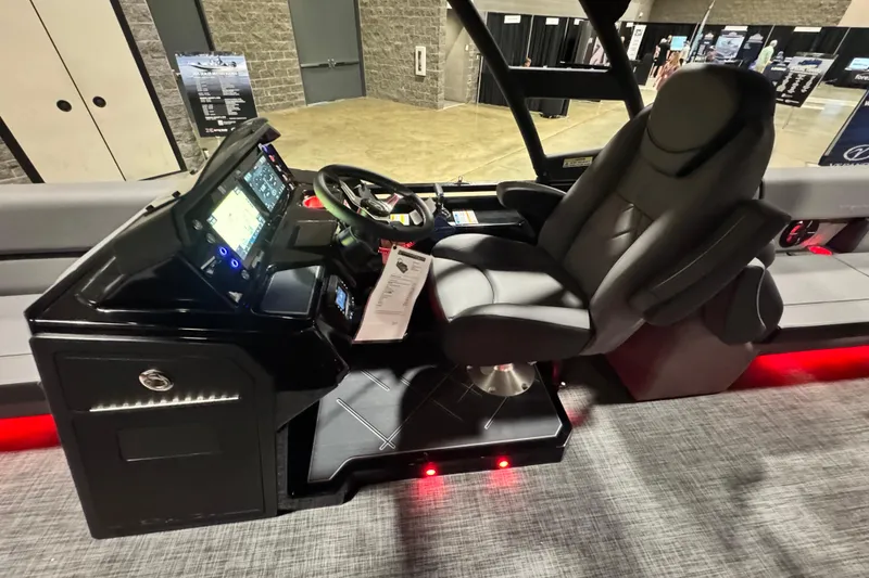 Slide: The Image of 2026 Veranda Vertex VX285DCRC Premium boat cockpit with modern controls and luxurious seating. - 12