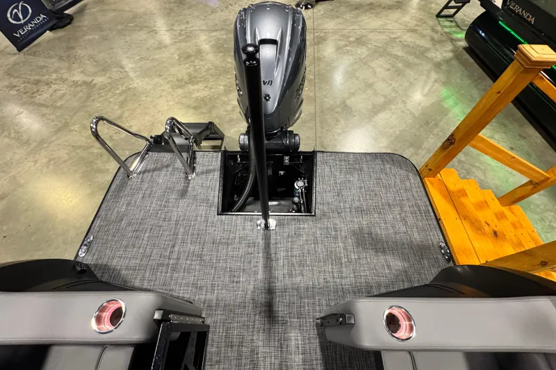Slide: The Image of 2026 Veranda Vertex VX285DCRC Premium boat deck with motor and seating. - 17