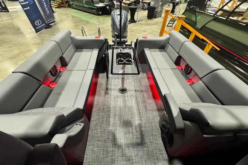 Slide: The Image of Luxurious interior of 2026 Veranda Vertex VX285DCRC Premium pontoon boat with red LED lighting. - 23