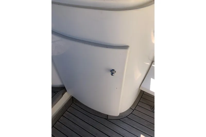 Slide: The Image of Birchwood Challenger 460 Flybridge 2002, white panel with handle, teak deck flooring. - 21