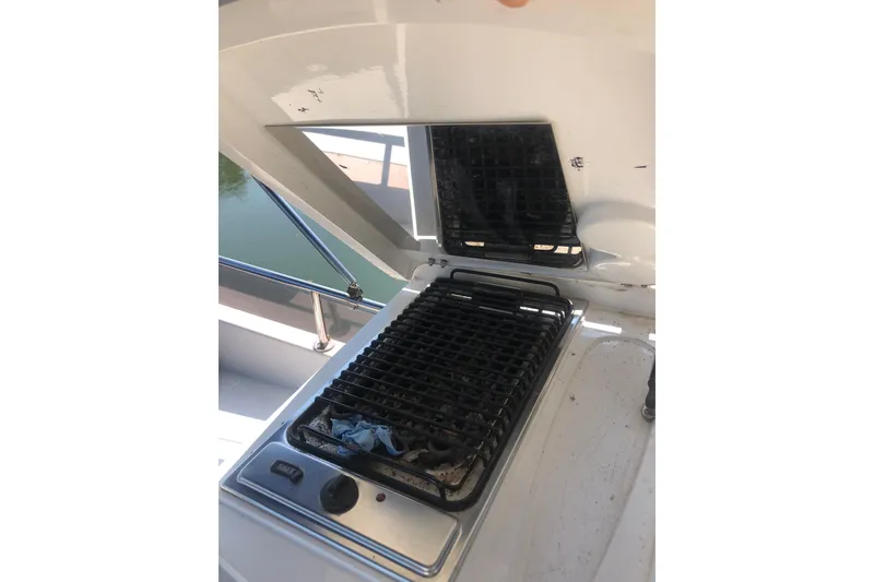 Slide: The Image of Outdoor grill on 2002 Birchwood Challenger 460 Flybridge yacht deck. - 24