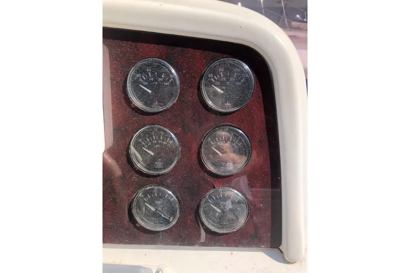Slide: The Image of Dashboard gauges on a 2002 Birchwood Challenger 460 Flybridge boat. - 34