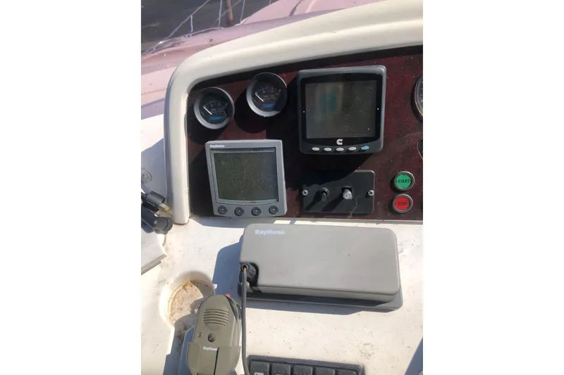 Slide: The Image of Control panel of 2002 Birchwood Challenger 460 Flybridge with navigation instruments. - 39