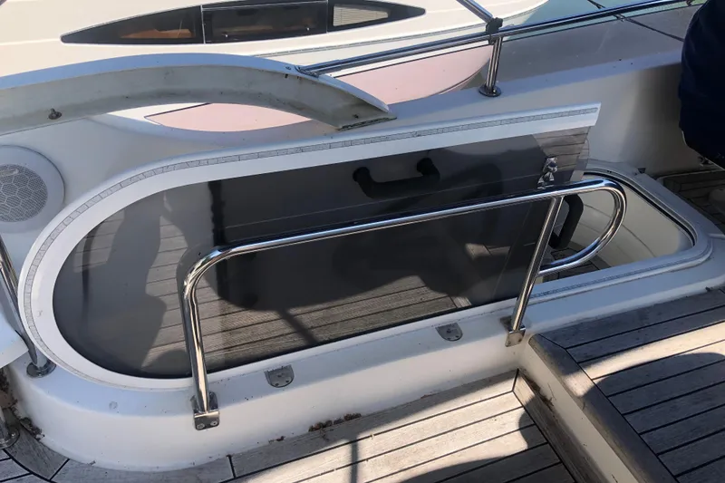 Slide: The Image of Birchwood Challenger 460 Flybridge 2002 yacht deck with stainless steel railing. - 48