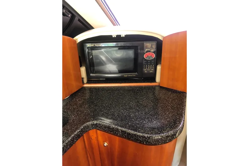 Slide: The Image of Microwave in Birchwood Challenger 460 Flybridge yacht kitchen, 2002 model. - 78