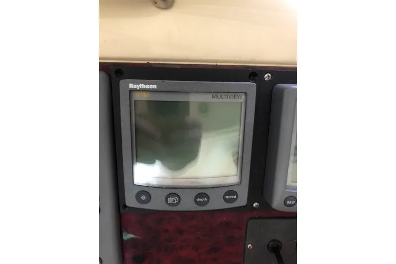 Slide: The Image of Raytheon ST60 multiview display on 2002 Birchwood Challenger 460 Flybridge. - 84