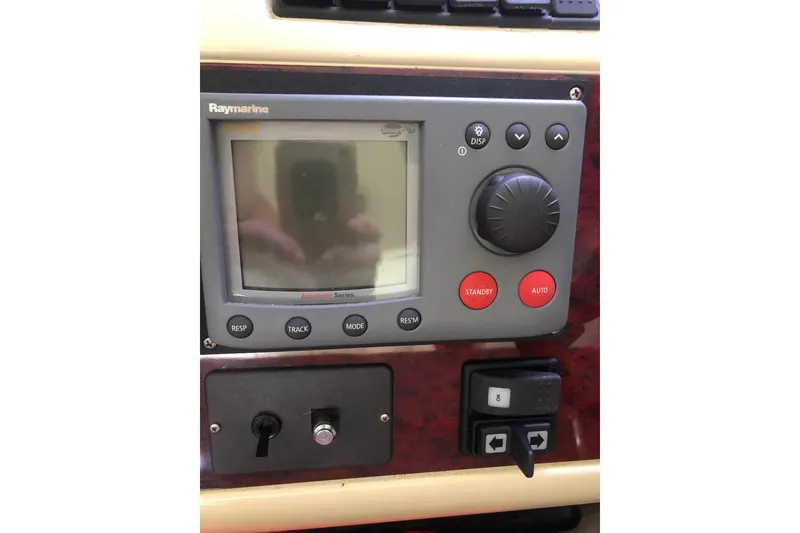 Slide: The Image of Control panel of 2002 Birchwood Challenger 460 Flybridge with Raymarine display. - 85