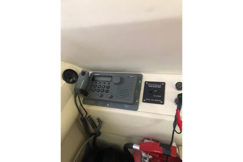 Slide: The Image of Control panel on 2002 Birchwood Challenger 460 Flybridge with communication equipment. - 86