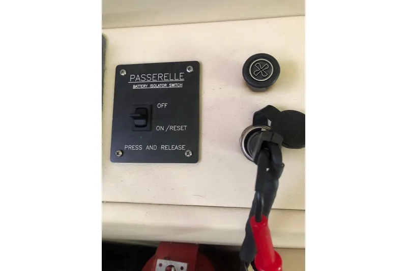 Slide: The Image of Battery isolator switch on 2002 Birchwood Challenger 460 Flybridge boat control panel. - 87