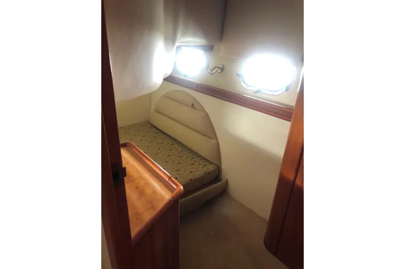 Slide: The Image of Cozy cabin interior of 2002 Birchwood Challenger 460 Flybridge yacht. - 96