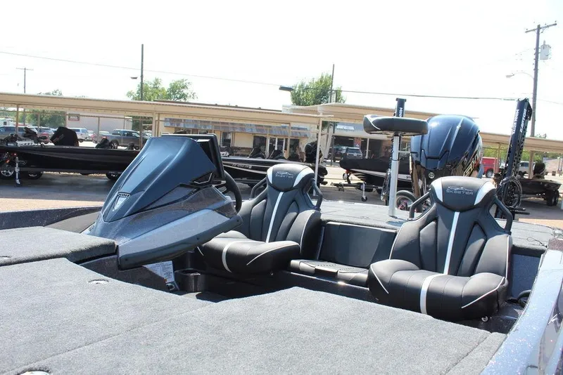 Slide: The Image of 2026 Skeeter ZXE20 boat interior with sleek seats and modern dashboard. - 15