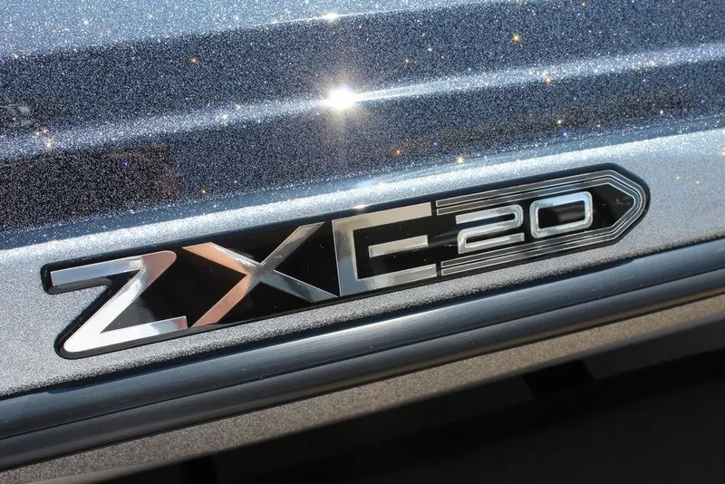 Slide: The Image of 2026 Skeeter ZXE20 logo on metallic surface, showcasing sleek design and branding. - 16