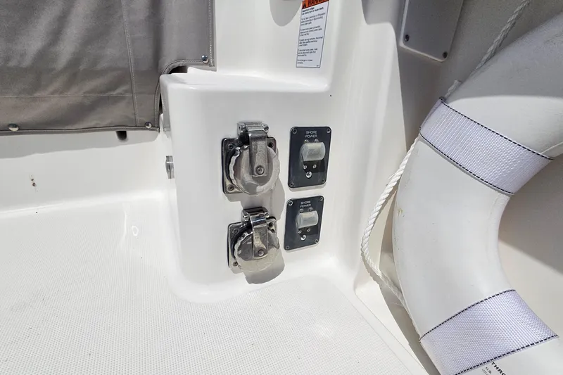 Slide: The Image of 2006 Tiara 3200 Open boat shore power connections and life preserver detail. - 14
