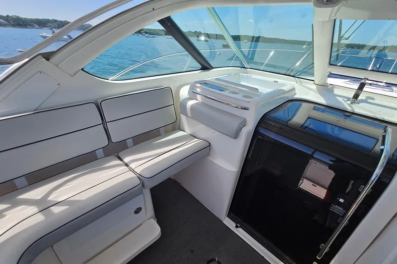 Slide: The Image of Interior of 2006 Tiara 3200 Open yacht with seating and ocean view. - 21