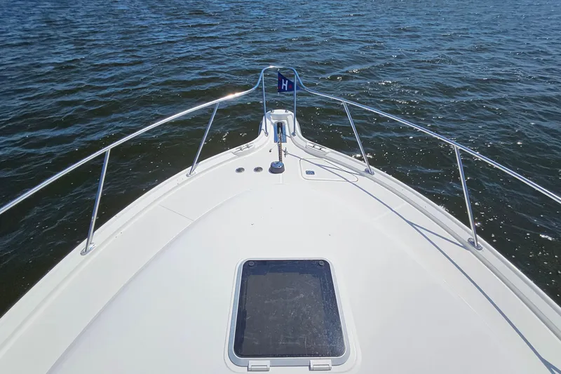 Slide: The Image of Bow view of 2006 Tiara 3200 Open yacht on open water. - 43