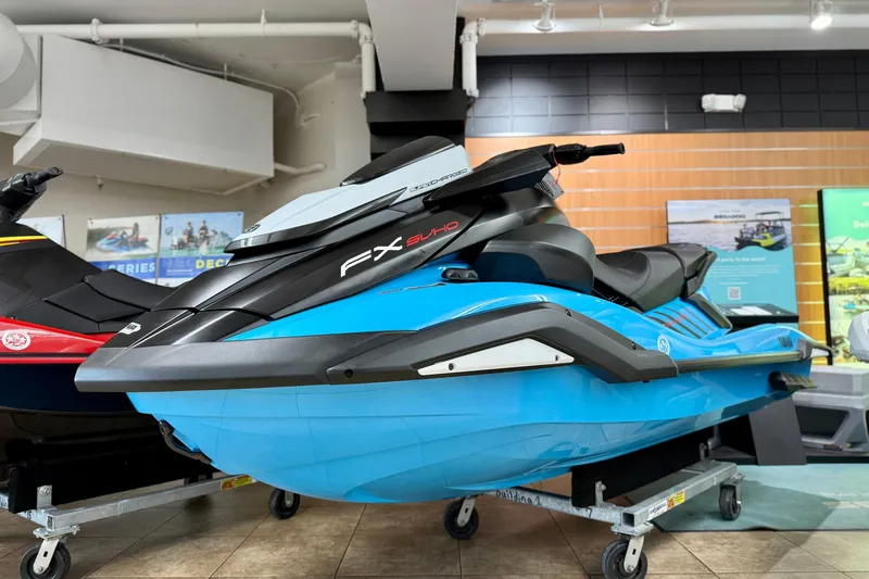 The Image of 2025 Yamaha WaveRunner FX SVHO in showroom, featuring sleek blue and black design. - 0