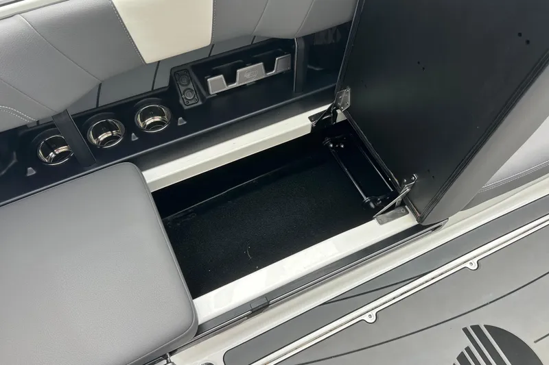 Slide: The Image of Open storage compartment in 2022 Malibu Wakesetter 23 LSV boat interior. - 15