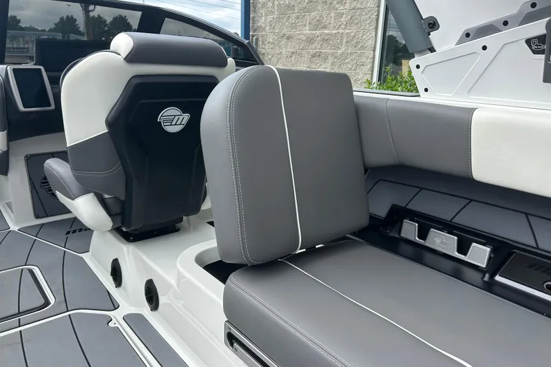 Slide: The Image of 2022 Malibu Wakesetter 23 LSV interior with gray and white seating, modern design. - 19