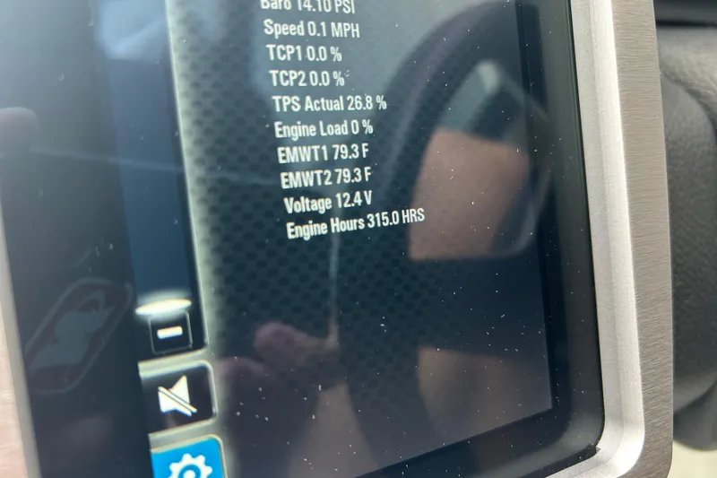 Slide: The Image of Dashboard display of 2022 Malibu Wakesetter 23 LSV showing engine metrics and hours. - 27