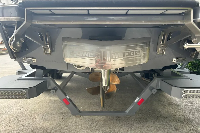 Slide: The Image of 2022 Malibu Wakesetter 23 LSV rear view with Power Wedge III and propeller. - 8