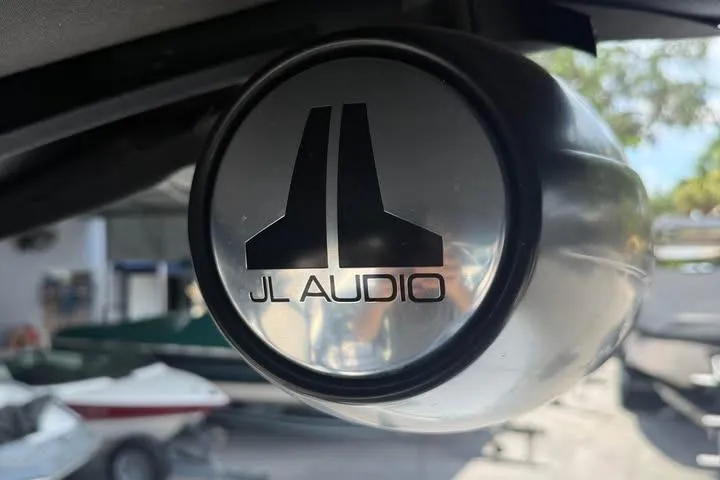 Slide: The Image of Speaker with JL Audio logo on a 2011 Axis A20 boat. - 6