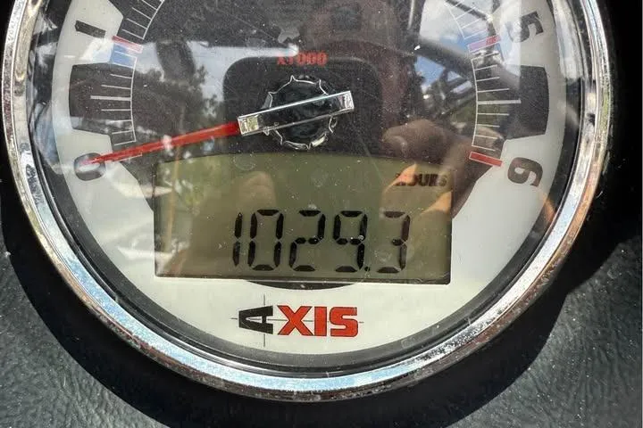 Slide: The Image of Close-up of Axis A20 2011 boat gauge displaying 1029.3 hours. - 9