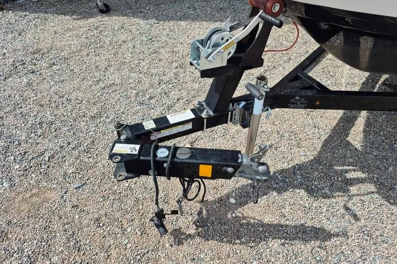 Slide: The Image of Trailer hitch of 2017 Chaparral Vortex 203 VRX on gravel surface. - 13