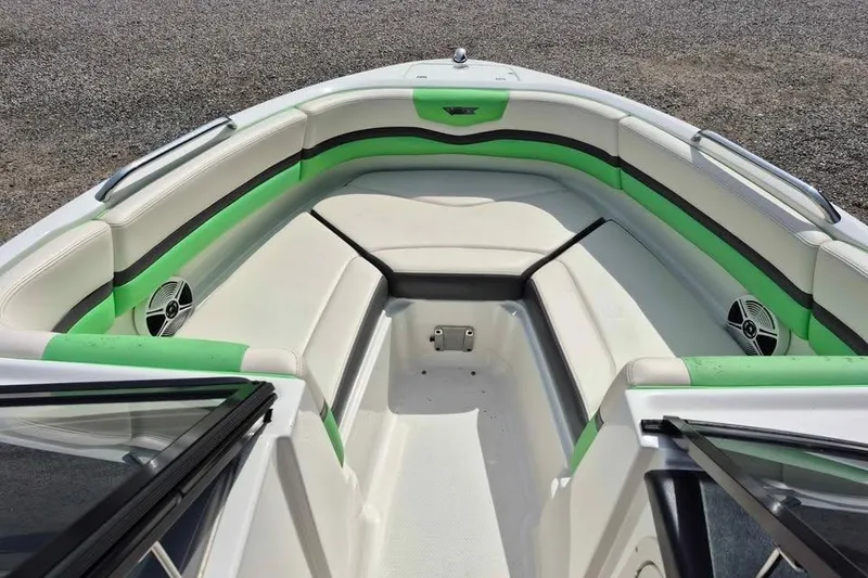 Slide: The Image of 2017 Chaparral Vortex 203 VRX boat interior with green and white seating. - 5