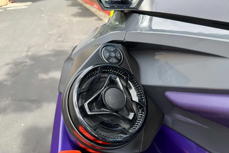 Slide: The Image of 2021 Sea-Doo RXT-X 300 speaker and control panel close-up. - 11