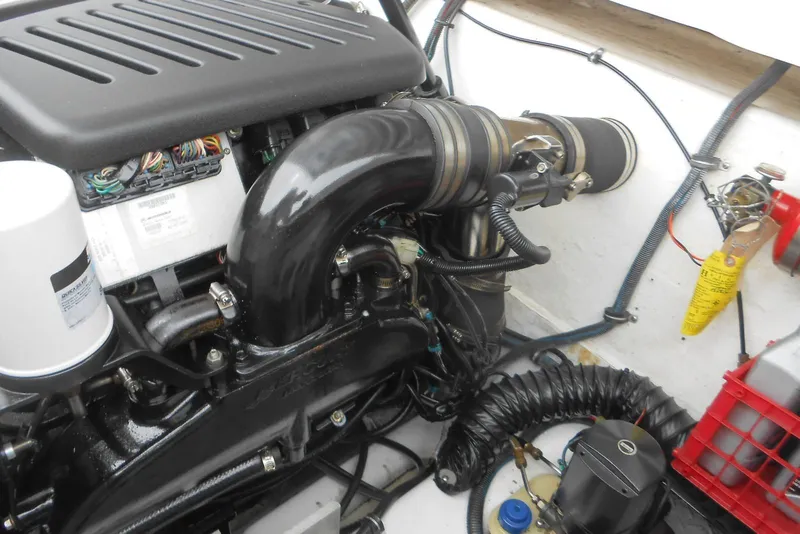 Slide: The Image of Engine compartment of a 2003 Formula 271 FASTech boat, showcasing detailed components. - 18