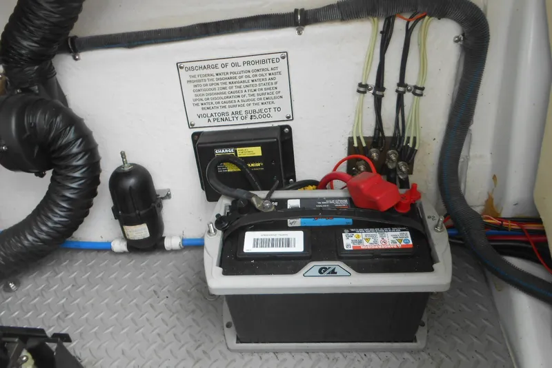 Slide: The Image of Battery setup in a 2003 Formula 271 FASTech boat engine compartment. - 22