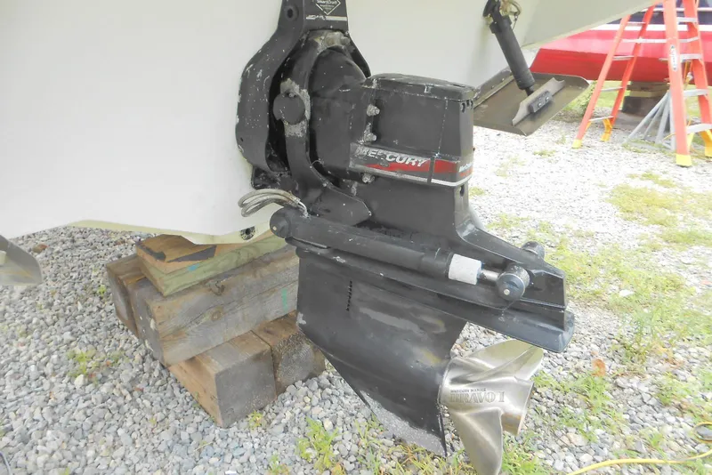 Slide: The Image of 2003 Formula 271 FASTech boat with Mercury outdrive on wooden blocks. - 27