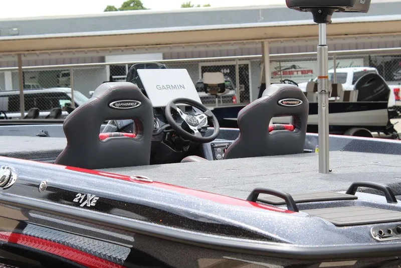 Slide: The Image of 2026 Phoenix 21 XE boat interior with Garmin navigation system, featuring sleek design and comfortable seating. - 14