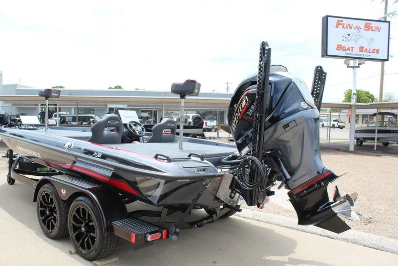 Slide: The Image of 2026 Phoenix 21 XE boat at Fun-N-Sun Boat Sales, featuring sleek design and powerful engine. - 6
