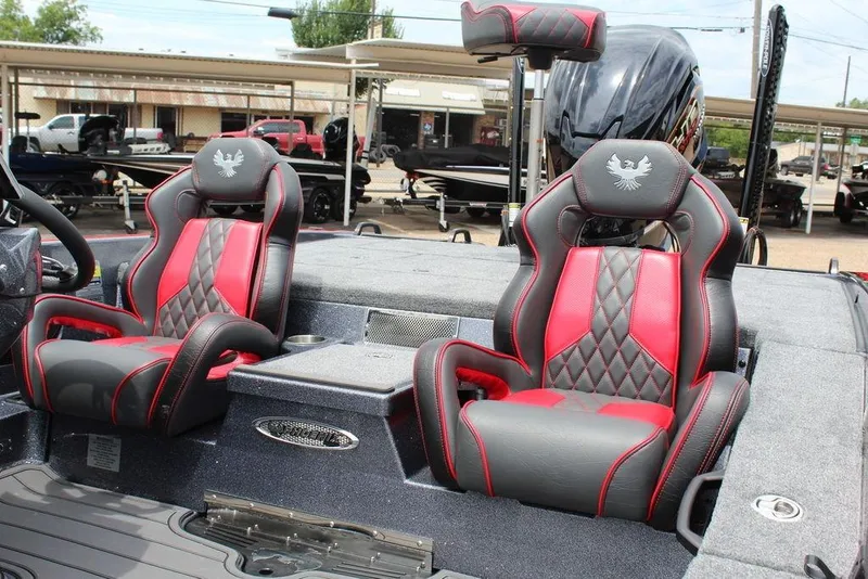 Slide: The Image of 2026 Phoenix 21 XE boat interior with red and black luxury seats. - 7