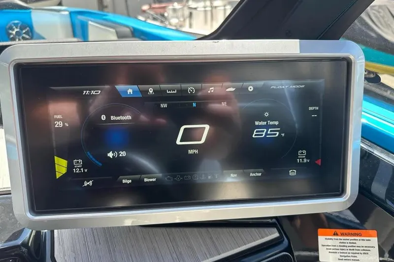 Slide: The Image of Dashboard display of 2023 Yamaha Boats 222XD showing speed, fuel, and water temperature. - 16