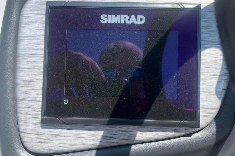 Slide: The Image of Simrad display on 2018 Veranda Relax VR 25 RC boat dashboard. - 16