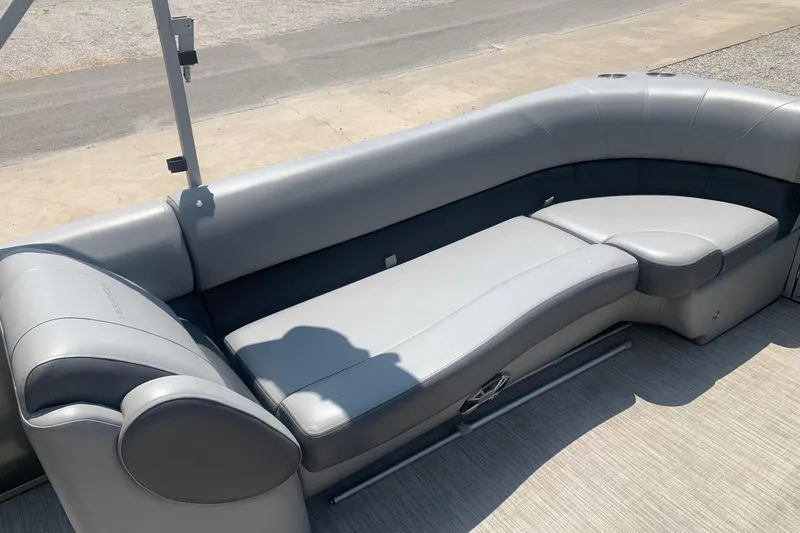 Slide: The Image of 2018 Veranda Relax VR 25 RC pontoon boat with gray cushioned seating. - 8