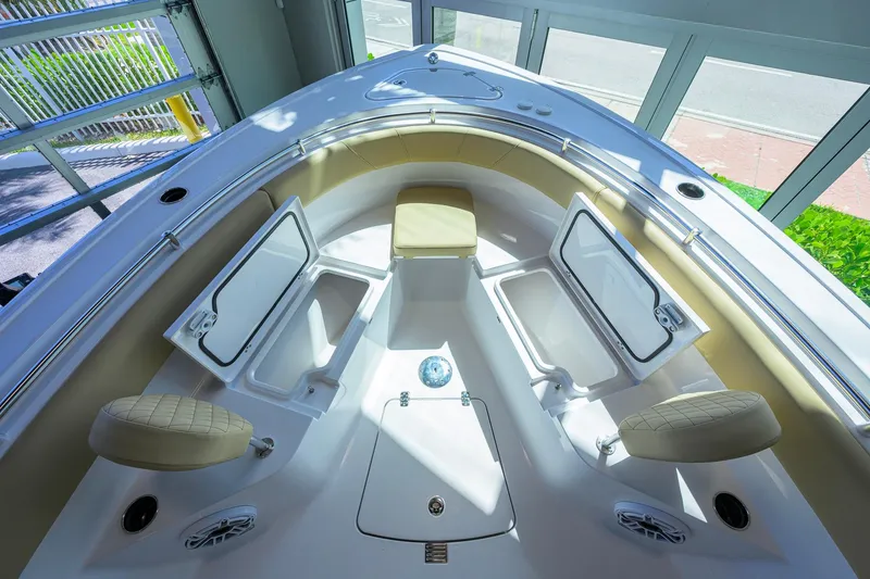 Slide: The Image of 2026 Sportsman Open 252 Center Console boat interior with open storage compartments. - 29