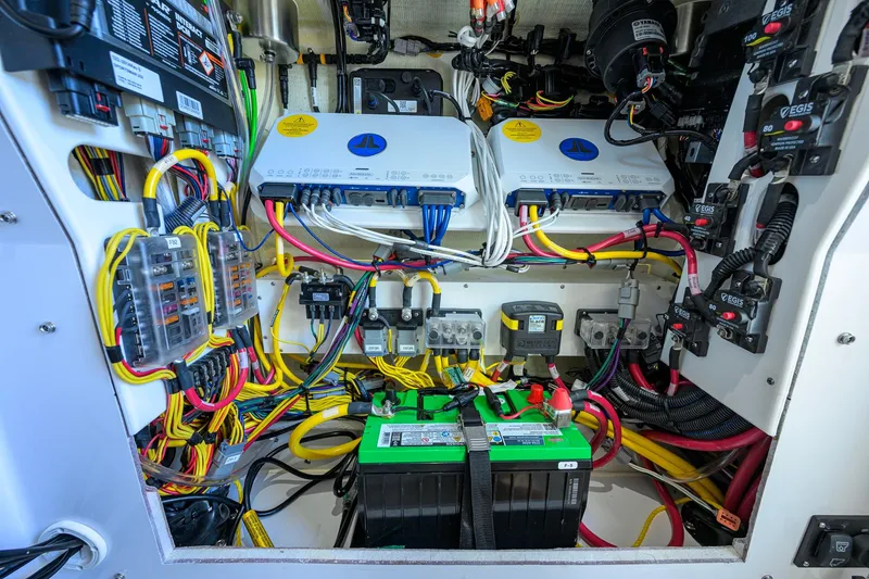 Slide: The Image of Electrical system of 2026 Sportsman Open 252 Center Console boat, featuring wiring and components. - 39