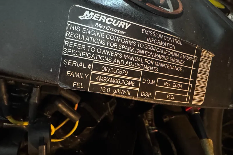 Slide: The Image of Mercury MerCruiser engine label on 2005 Cruisers Yachts 340 Express, showing emission details. - 29