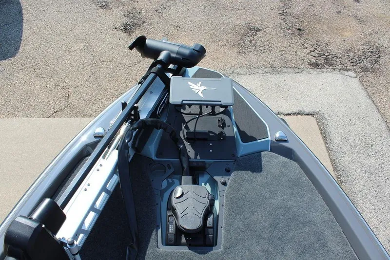 Slide: The Image of 2026 Skeeter ZXE21 boat deck with trolling motor and control panel. - 13