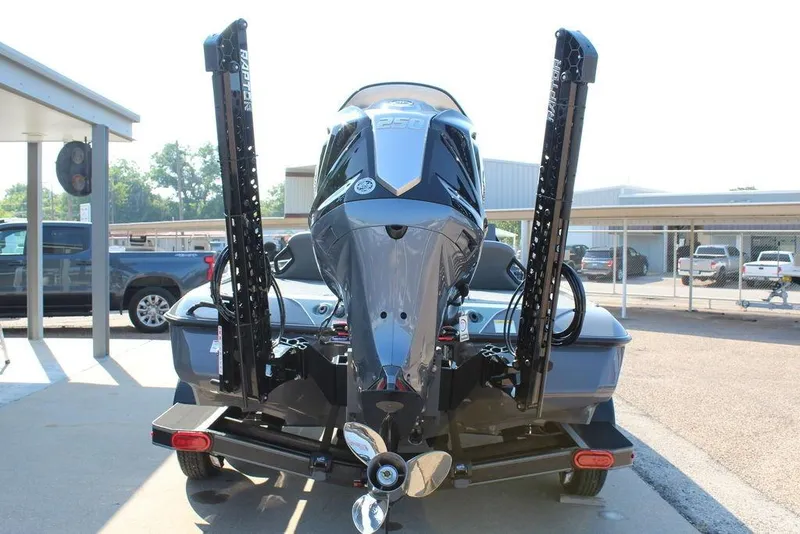 Slide: The Image of 2026 Skeeter ZXE21 boat with powerful outboard motor and dual power poles. - 3