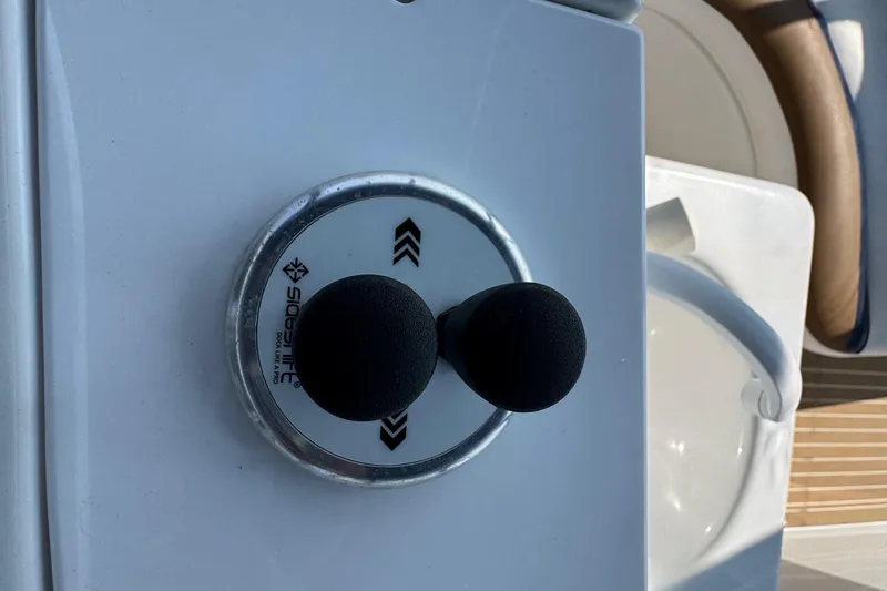 Slide: The Image of Close-up of throttle controls on a 1997 Mainship 40 Sedan Bridge boat. - 19