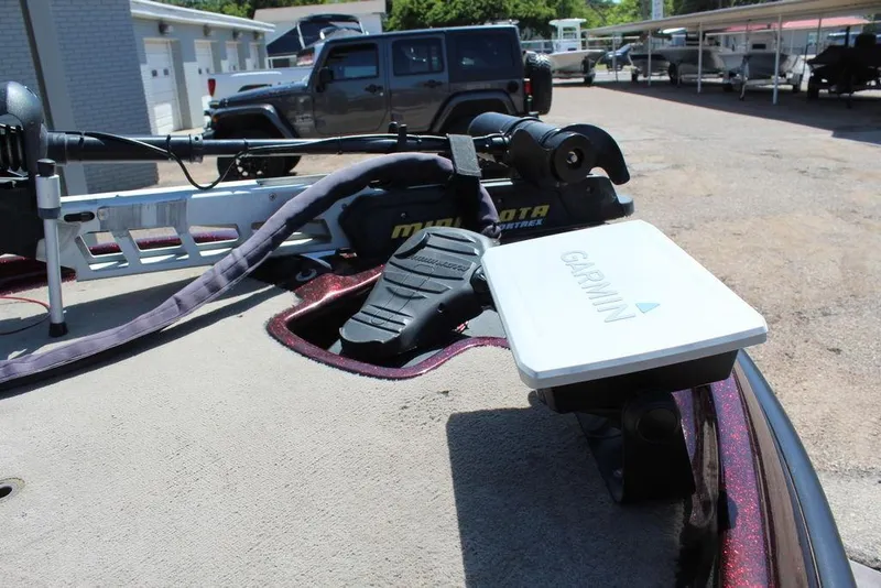 Slide: The Image of 2007 Bass Cat Cougar boat with Garmin and Minn Kota equipment on deck. - 20