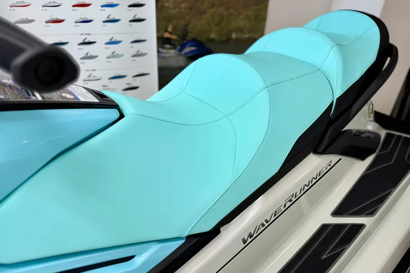 Slide: The Image of 2025 Yamaha WaveRunner FX Cruiser HO with turquoise seat, close-up view. - 6