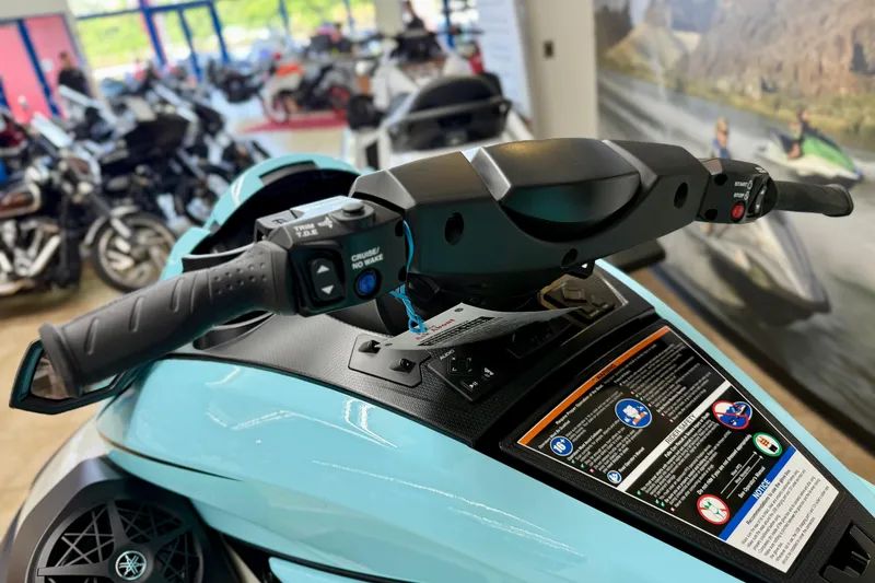 Slide: The Image of 2025 Yamaha WaveRunner FX Cruiser HO handlebars in a showroom setting. - 7