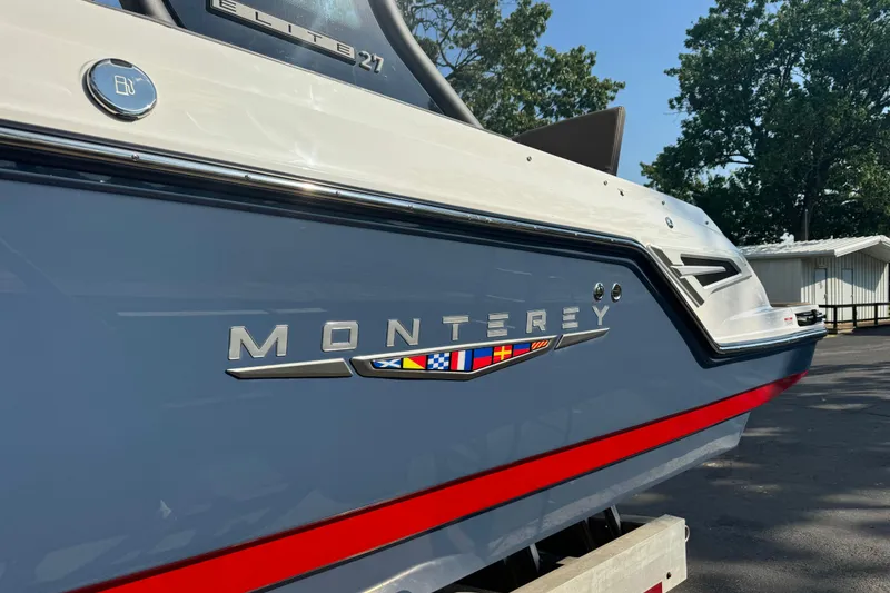 Slide: The Image of 2026 Monterey Elite 27 SD boat with sleek design and vibrant detailing. - 8
