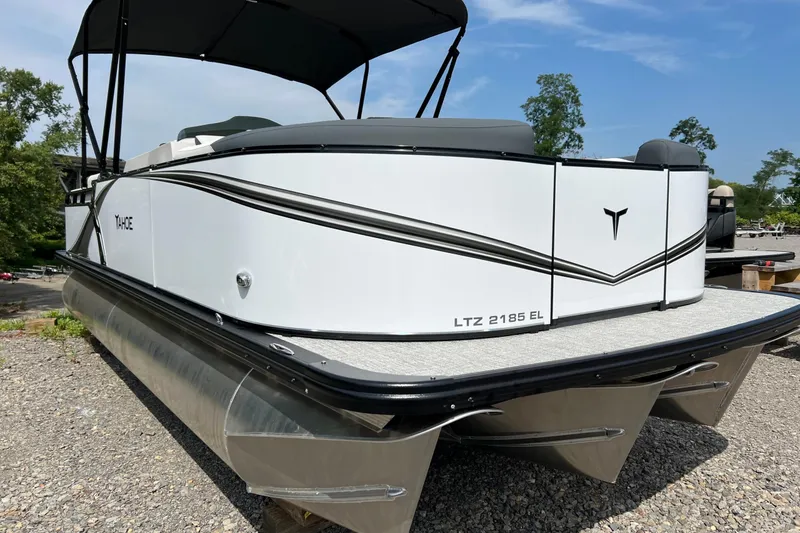 Slide: The Image of 2026 Tahoe TRITOON 2185 pontoon boat with sleek design and modern features. - 3